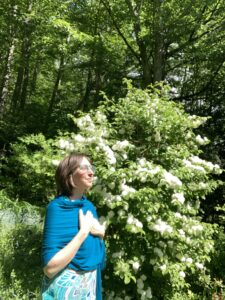 Rebecca Roots with hand on heart